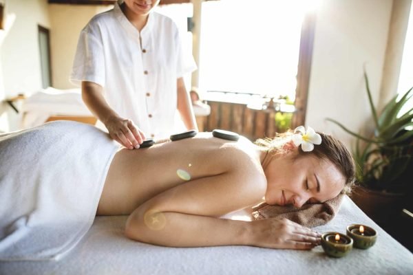 Woman getting a hot stone massage